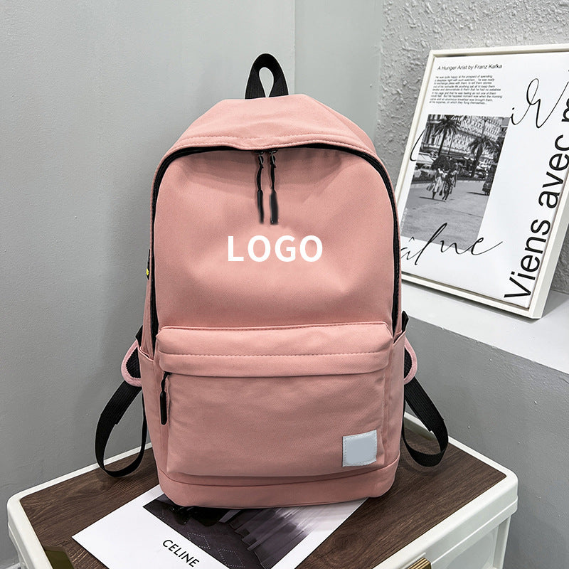 Una mochila de nylon moderna de dropshipping, mochila estampada de gran capacidad y con estampado elegante, mochila de estudiante universitario con alfabeto para la vuelta al cole