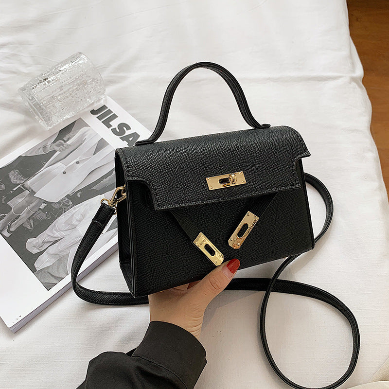 Bolsos de mujer 2025 primavera/otoño Nueva moda de botón Bolsos de mujer Bolsos de mujer de un solo hombro en relieve de moda Bolso bandolera cruzado de moda