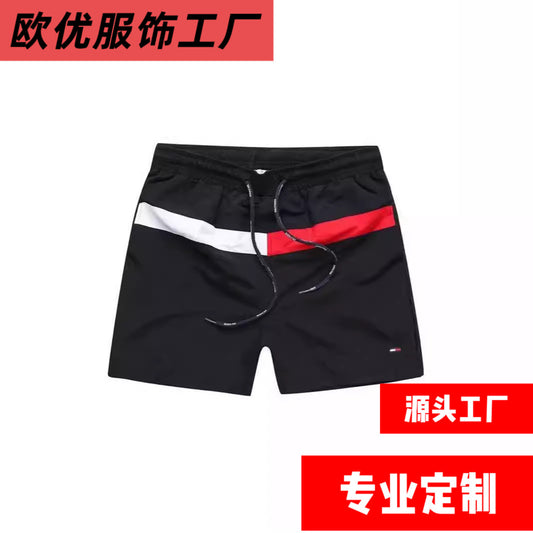 Puesto callejero de fitness para jóvenes de verano transfronterizo, pantalones de tres cuartos de surf en la playa de secado rápido, pantalones cortos deportivos, pantalones cortos de playa europeos y americanos para hombres