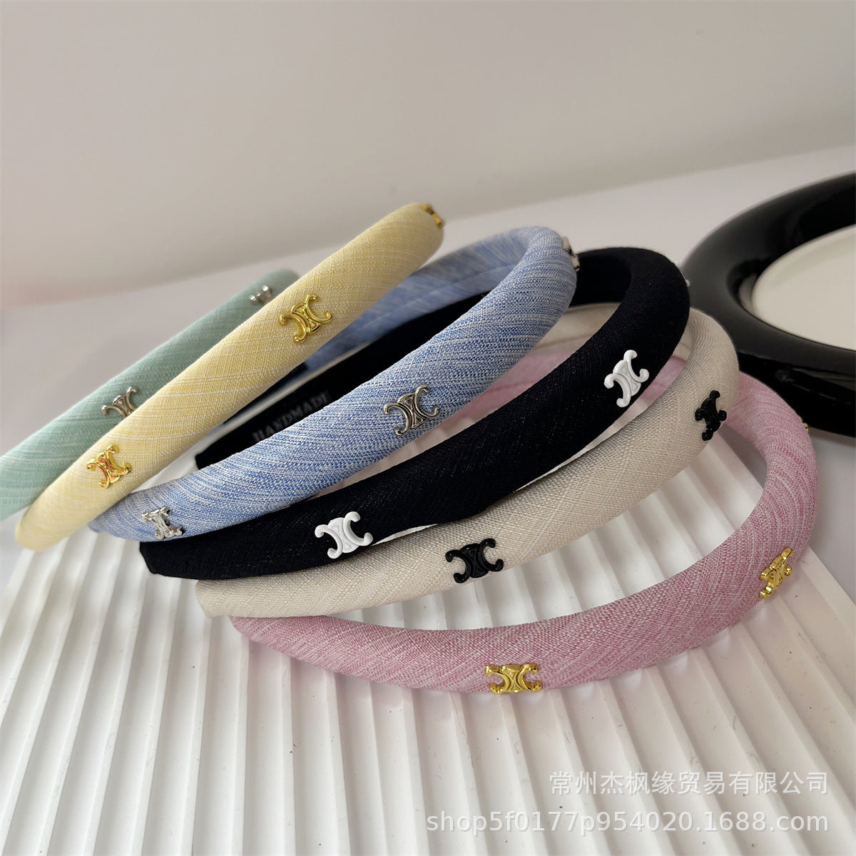 Pulsera fina Triumphal de Triomphe, moño de pinzas de alta gama, limpiador facial planchado y nuevo accesorio de corona alta para mujeres