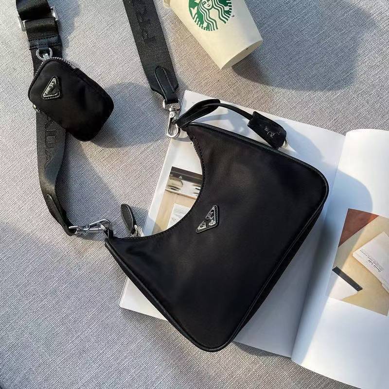 Bolso de hombro original de tejido de nailon de comercio exterior al por mayor, bolso triangular de alta calidad Dongguan tres en uno para las axilas, bandolera