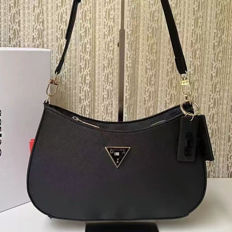 GS Adivina el nuevo bolso europeo y americano sencillo de un solo hombro con viento cruzado y de forma de brazo cruzado, bolso de bolita de color sólido bolso de luna creciente