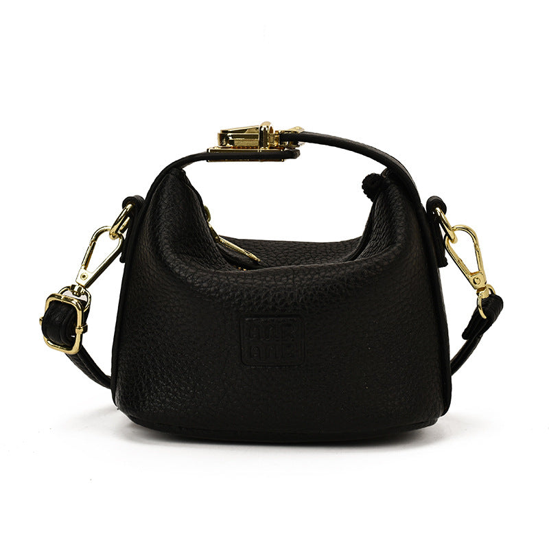 Bolso mini de dumplings de vaquero transfronterizo, bolso ligero de lujo de alta gama, versátil y de moda, bolso de mujer, bolso bandolera infantil de nicho coreano