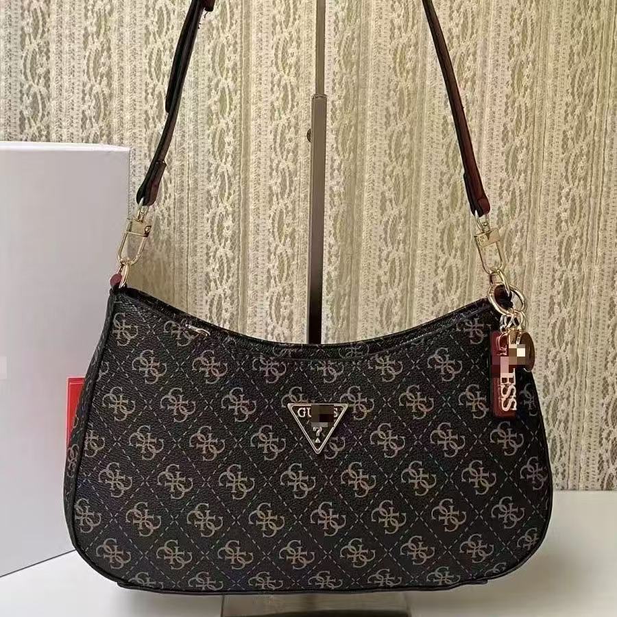 GS Adivina el nuevo bolso europeo y americano sencillo de un solo hombro con viento cruzado y de forma de brazo cruzado, bolso de bolita de color sólido bolso de luna creciente