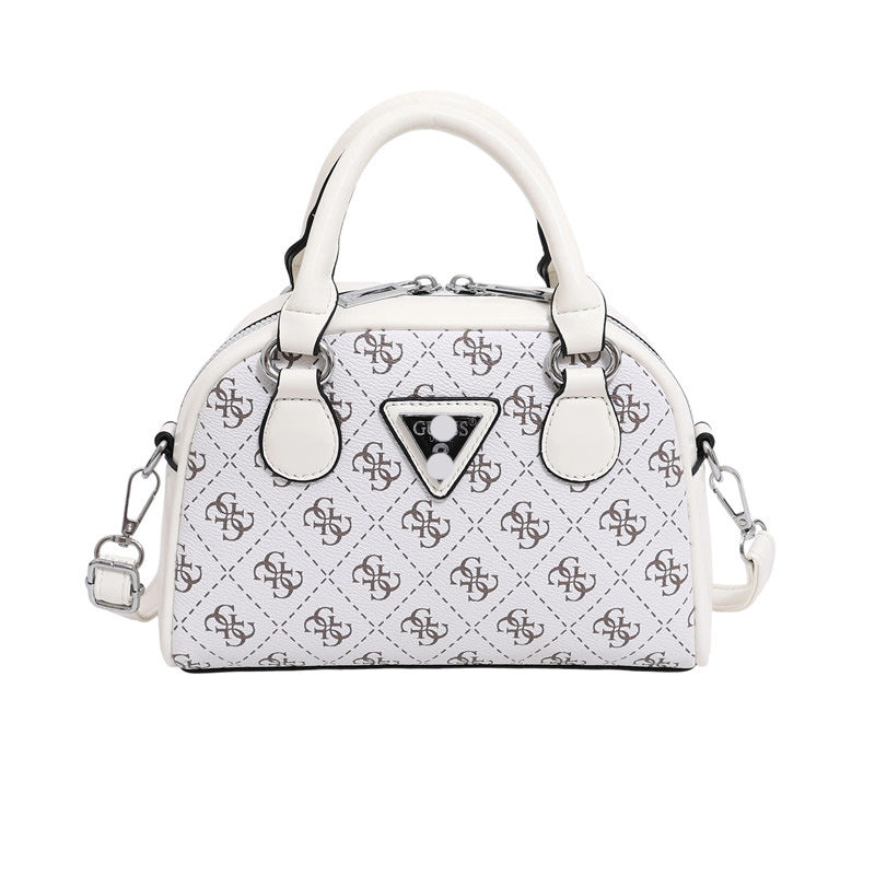 Comercio extranjero bolso de un solo hombro flor antigua para mujer otoño e invierno 2025 bolso de bolos contrastante bolso bandolera de moda y versátil