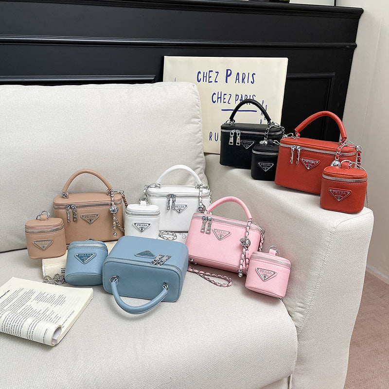 Nuevo bolso de cartero primavera/verano, bolso de maquillaje de mujer, bolso infantil mini crossbody premium premium versátil para niños