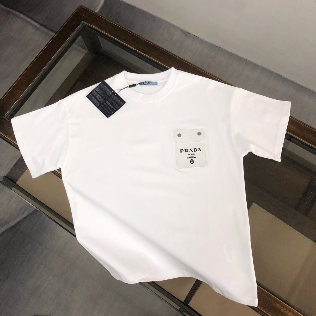 Versión de lujo de alta gama pra Pujia triángulo metálico LOGO, camiseta unisex de verano suelta y versátil con estampado y manga corta