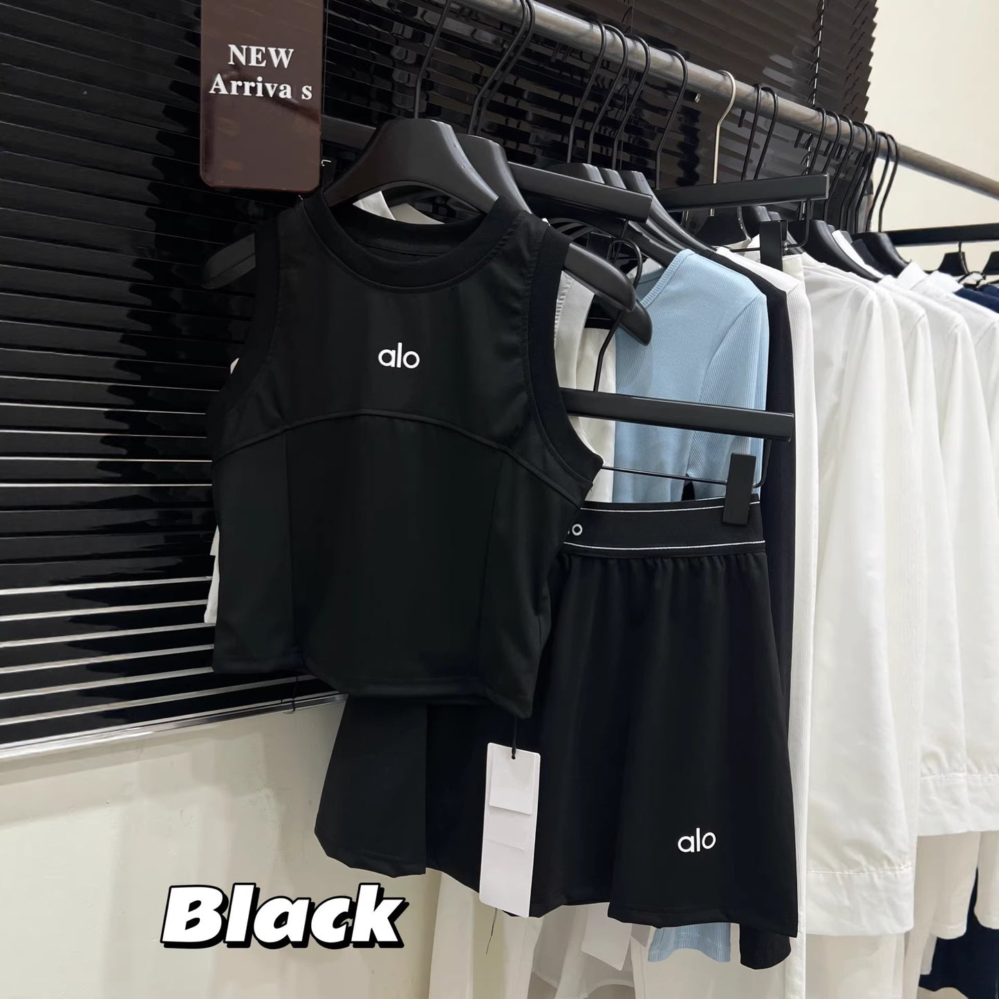 2026 Nuevo set deportivo de secado rápido falda antiexposición para tenis Chaleco de yoga de bádminton I-Letter Camiseta de manga corta para mujer