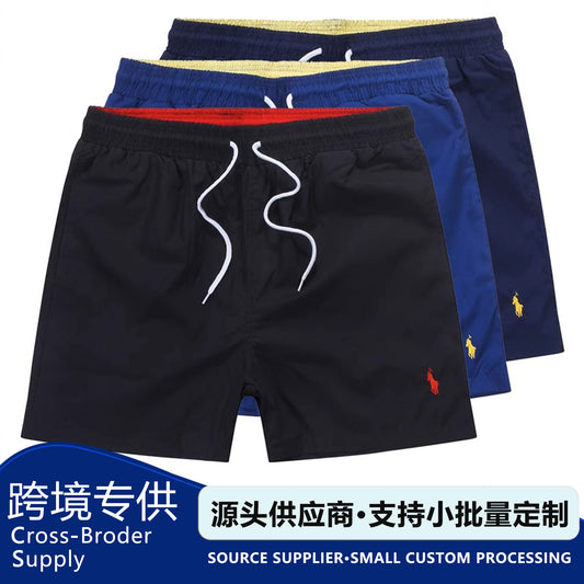 Polo de playa masculino de verano 2026 Shorts surf de tres puntas bordados con cordones Rápido Pantalones deportivos holgados Casual para casa