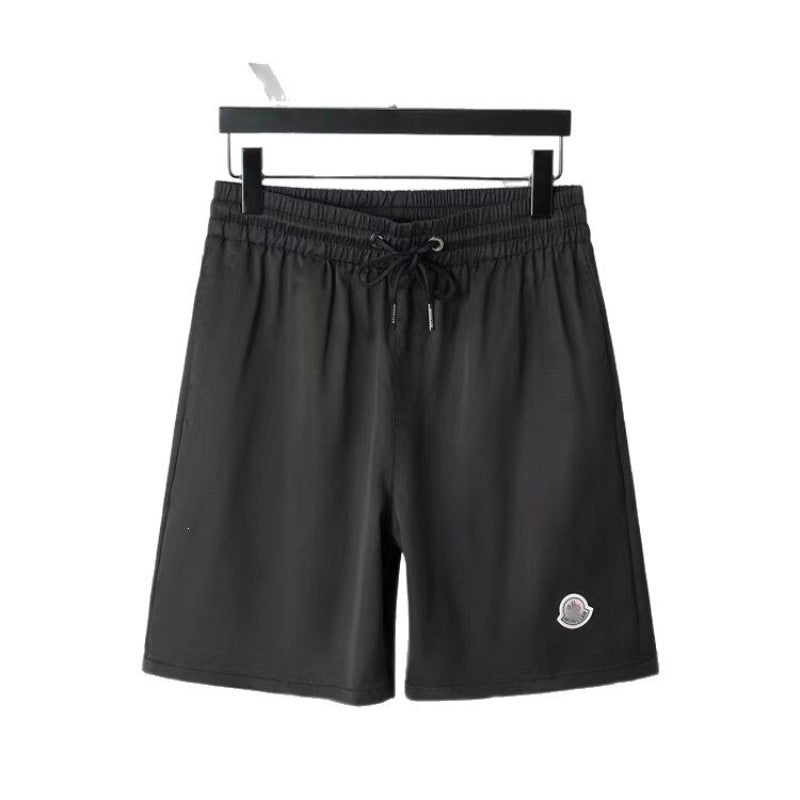 Verano 2026 Nuevos pantalones de playa transfronterizos europeos y americanos de secado rápido, pantalones cortos casuales holgados y de moda al por mayor