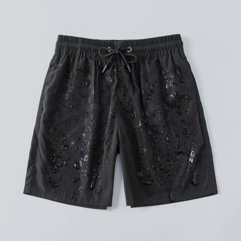 Verano 2026 Nuevos pantalones de playa transfronterizos europeos y americanos de secado rápido, pantalones cortos casuales holgados y de moda al por mayor