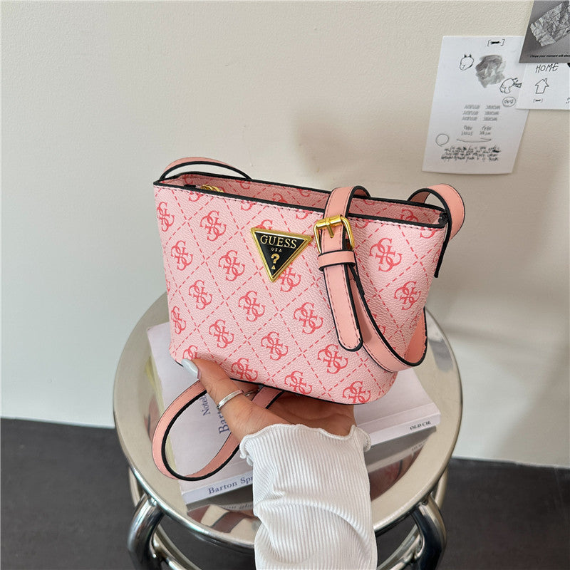Bolsos de mujer, cartas impresas europeas y americanas transfronterizas, bolso bucket versátil de un solo hombro, diseño de nicho, bolso cruzado ligero y de lujo