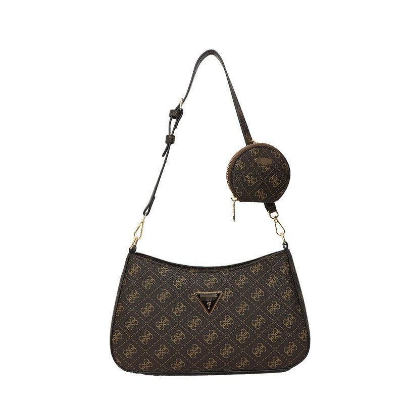 Comercio exterior al por mayor, bolso retro GS Guesser europeo y americano, bolso de hombro de moda de suegra con estampado transfronterizo