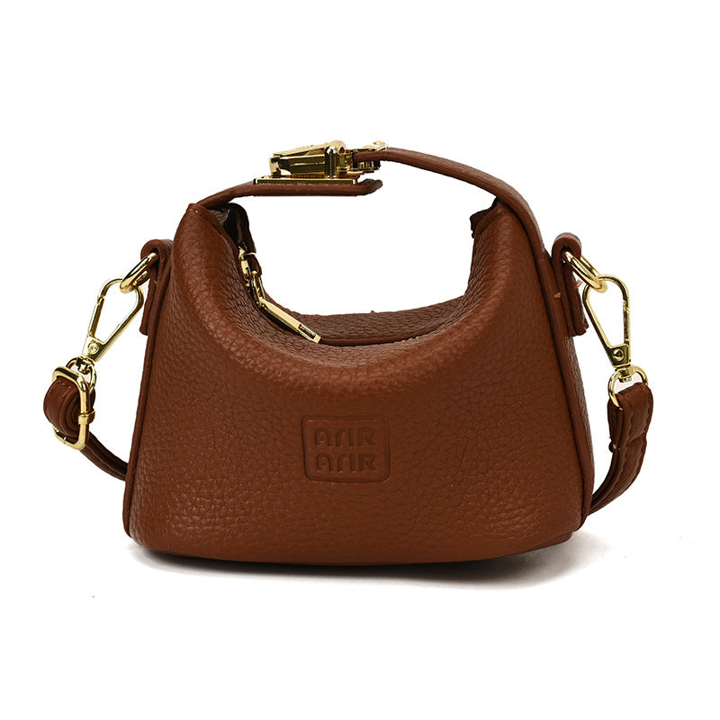 Bolso mini de dumplings de vaquero transfronterizo, bolso ligero de lujo de alta gama, versátil y de moda, bolso de mujer, bolso bandolera infantil de nicho coreano