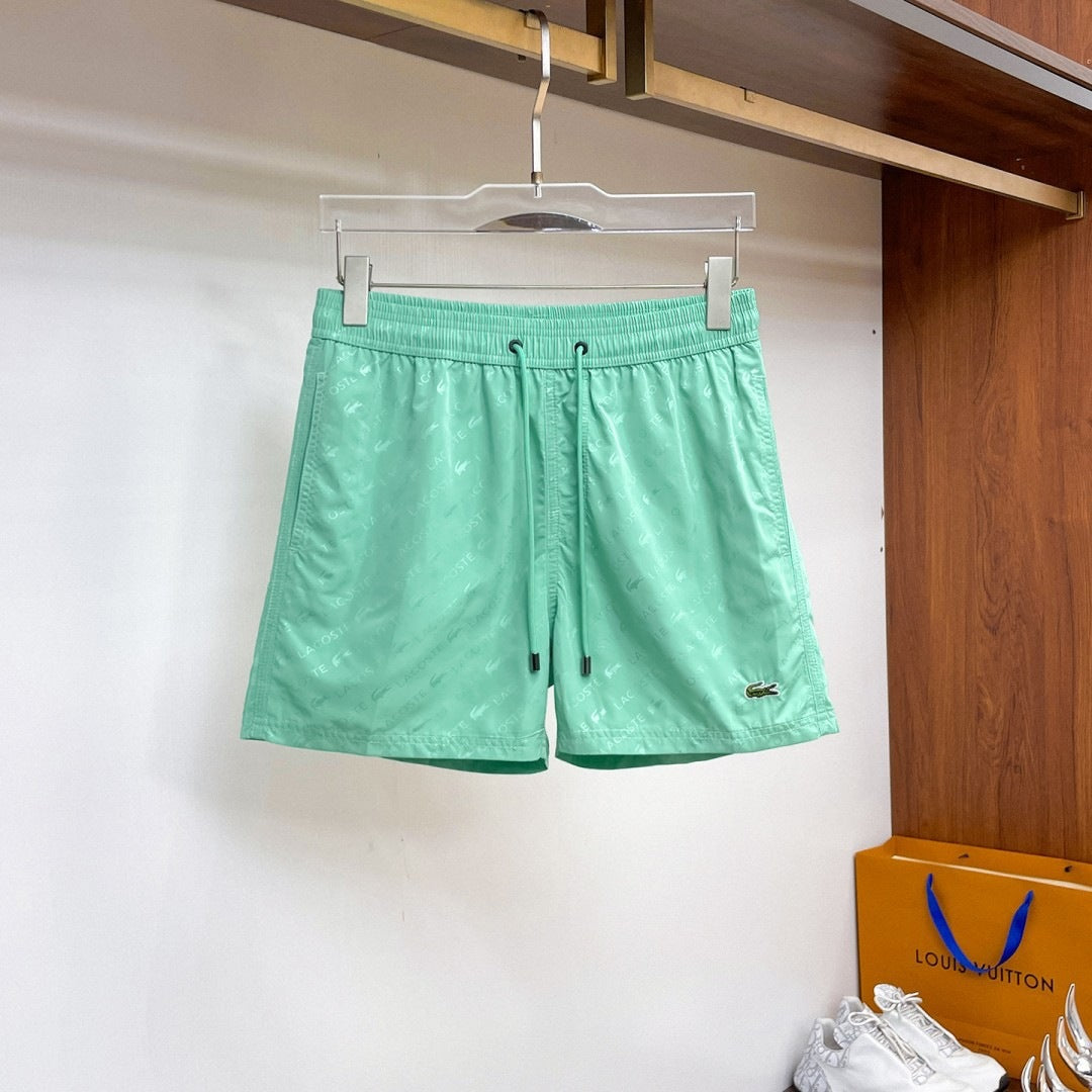 Nuevos pantalones cortos de playa para verano, pantalones deportivos casuales de secado rápido, estilo masculino holgado en stock, otras marcas