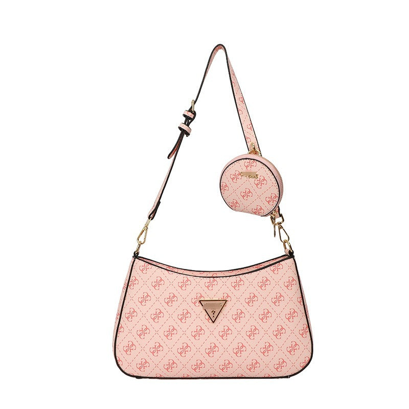 Comercio exterior al por mayor, bolso retro GS Guesser europeo y americano, bolso de hombro de moda de suegra con estampado transfronterizo