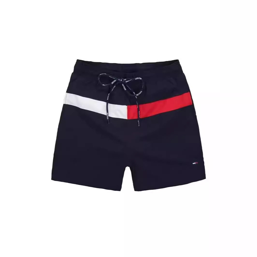 Puesto callejero de fitness para jóvenes de verano transfronterizo, pantalones de tres cuartos de surf en la playa de secado rápido, pantalones cortos deportivos, pantalones cortos de playa europeos y americanos para hombres