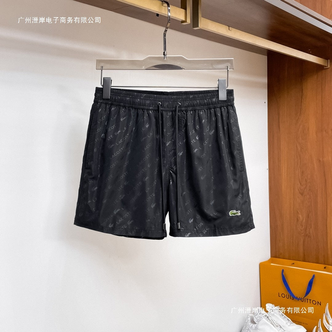 Nuevos pantalones cortos de playa para verano, pantalones deportivos casuales de secado rápido, estilo masculino holgado en stock, otras marcas