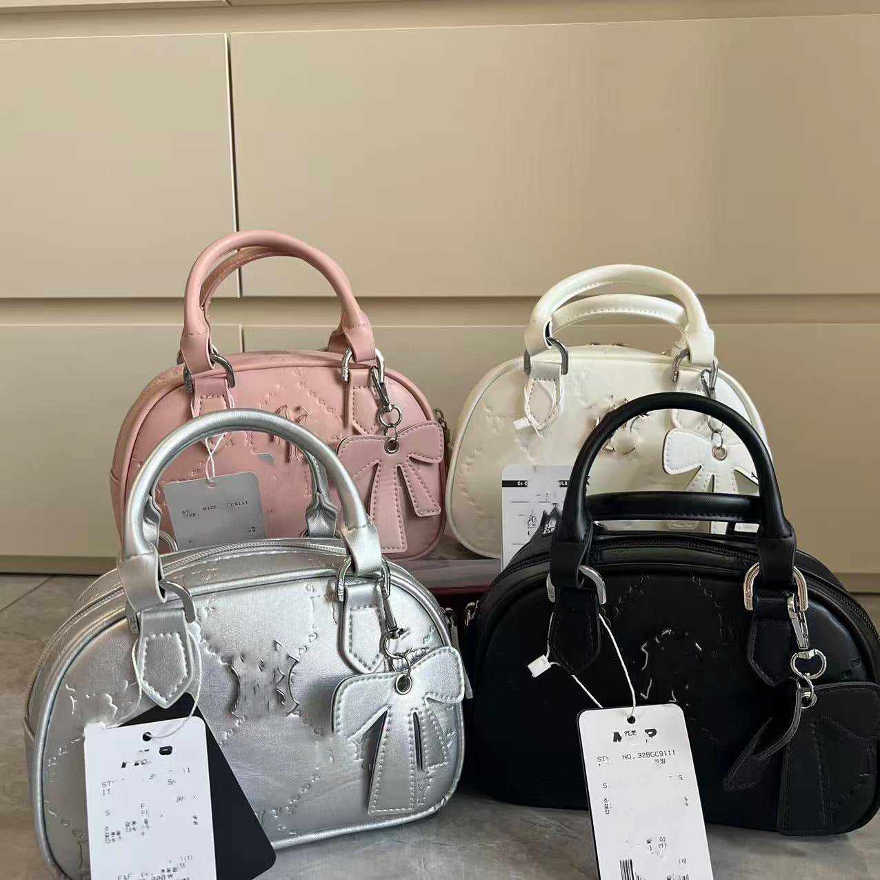 Bolsa de bolos nueva para ML coreana transfronteriza colgante, bolso de un solo hombro, bolso de mano, bolso versátil de moda, bolso de comercio exterior para mujeres