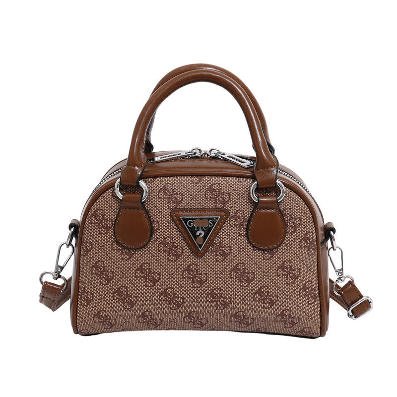 Comercio extranjero bolso de un solo hombro flor antigua para mujer otoño e invierno 2025 bolso de bolos contrastante bolso bandolera de moda y versátil