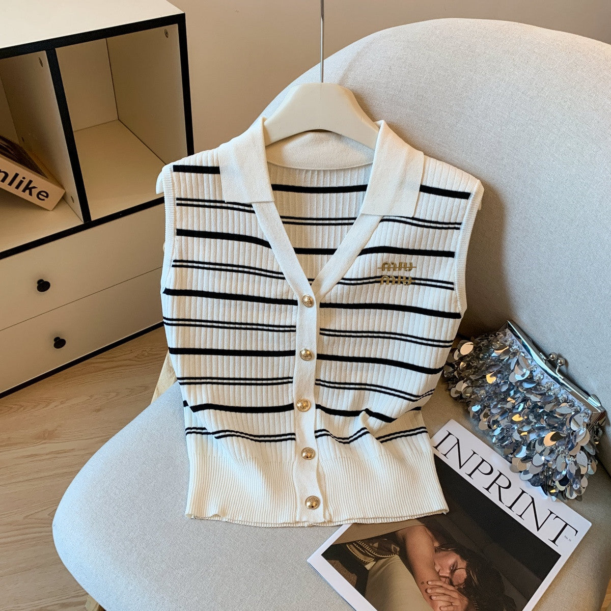 Ligero lujo y chaleco sin mangas estilo Chanel de alta gama, verano 2026 nuevo top de punto bordado versátil bordado