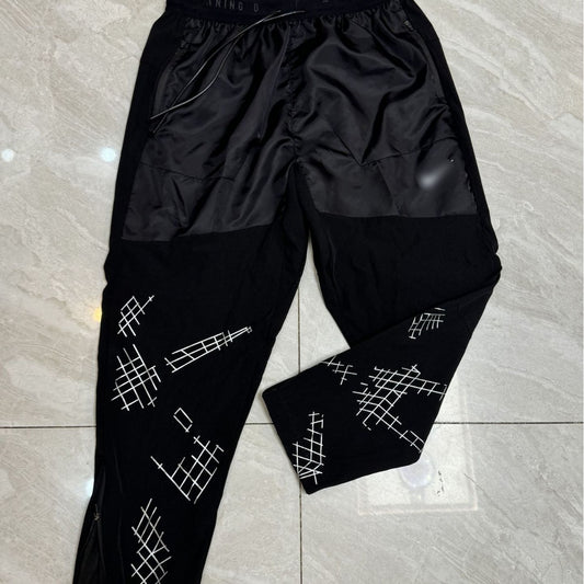 Versión alta transfronteriza de una serie deportiva de varios bolsillos, tela de secado rápido y pantalones deportivos de moda estampados para exteriores