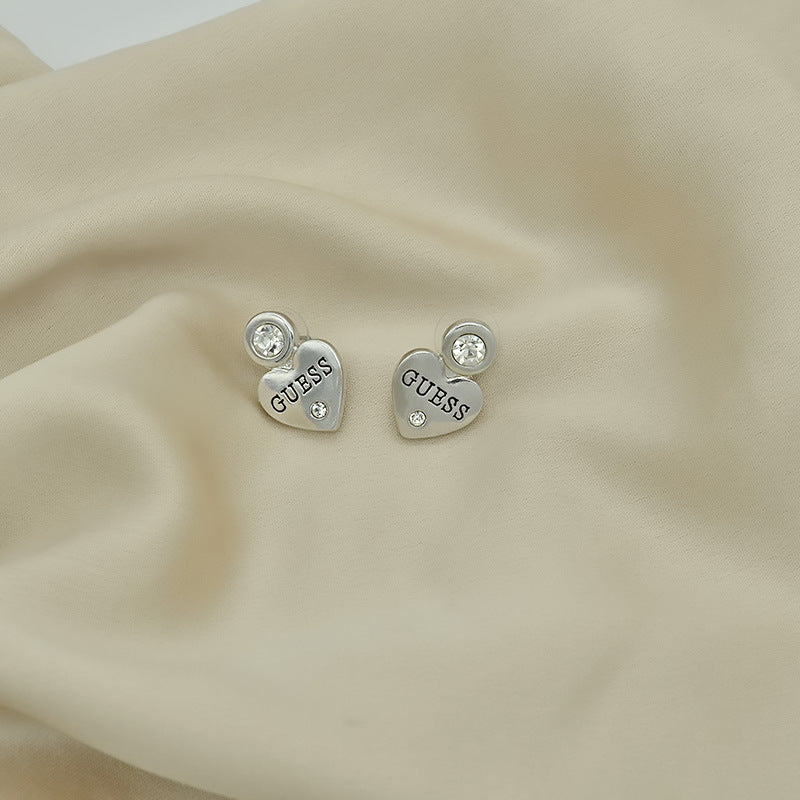 Letras incrustadas de corazón melocotón europeas y estadounidenses exportan, pendientes sencillos de pendientes para mujer, elegancia de nicho