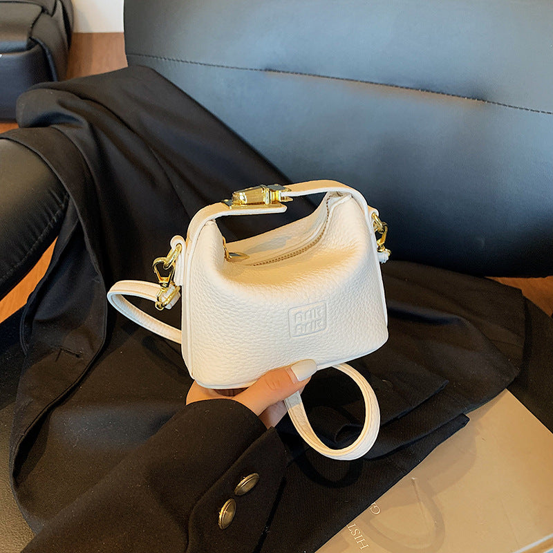 2025 Otoño Nuevo Nicho Bolso de Mano de Color Liso Alta Estética Casual Mono de Cuero Suave de Hombro Bandolera Bolso Pequeño Cuadrado
