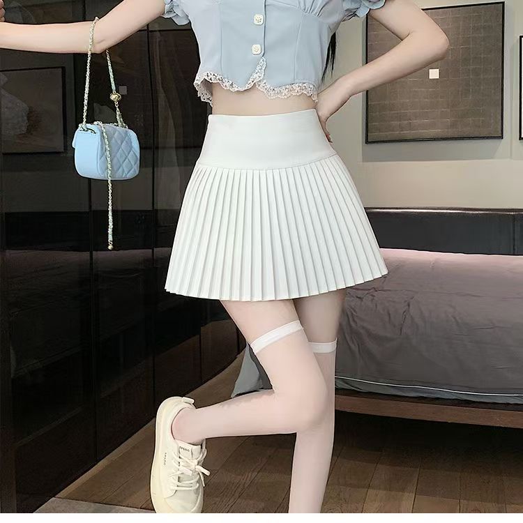 Jupe plissée courte pour femme, nouvelle jupe midi printemps/été, nouvelle jupe trapèze taille haute, amincissante, noir et blanc, anti-exposition