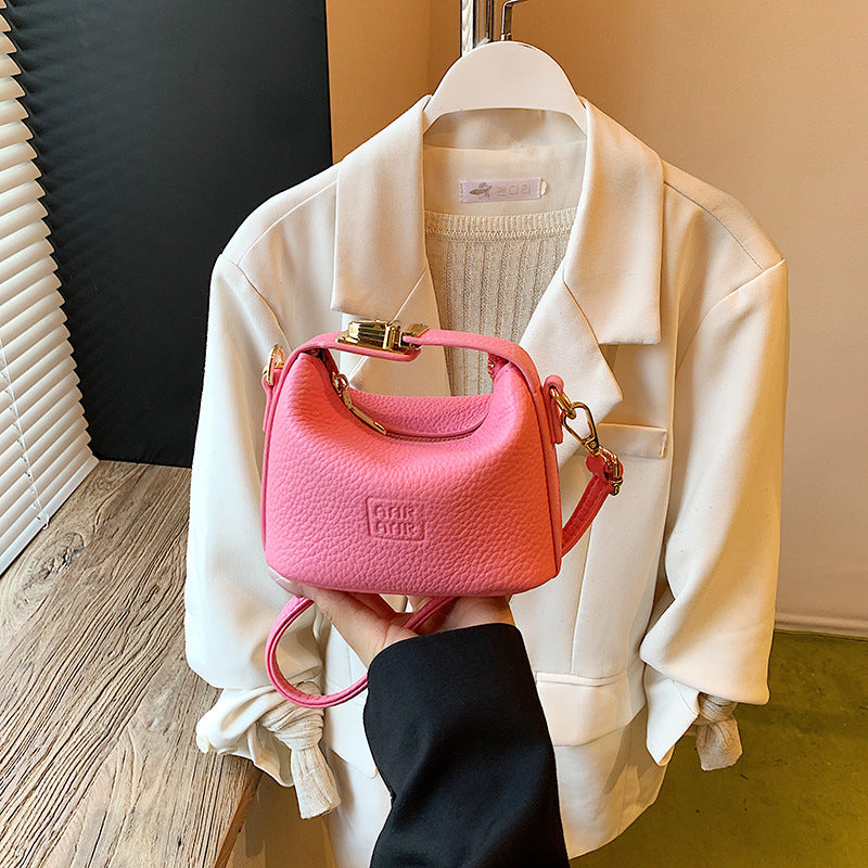 2025 Otoño Nuevo Nicho Bolso de Mano de Color Liso Alta Estética Casual Mono de Cuero Suave de Hombro Bandolera Bolso Pequeño Cuadrado