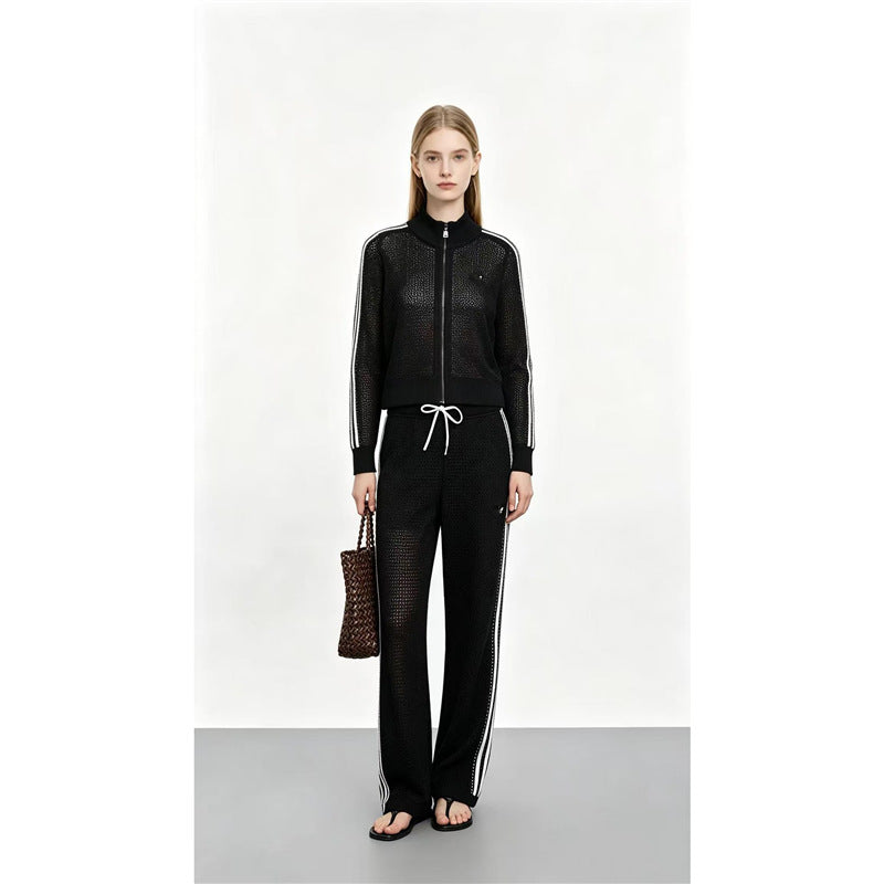 Completo donna in maglia traforata, maglietta a maniche lunghe e pantaloni, due pezzi