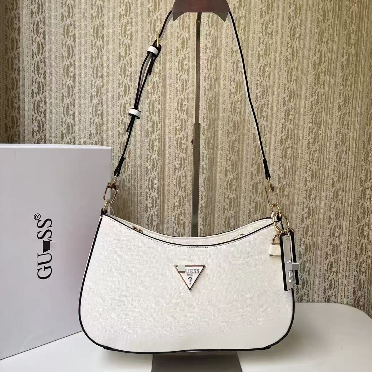 GS Adivina el nuevo bolso europeo y americano sencillo de un solo hombro con viento cruzado y de forma de brazo cruzado, bolso de bolita de color sólido bolso de luna creciente