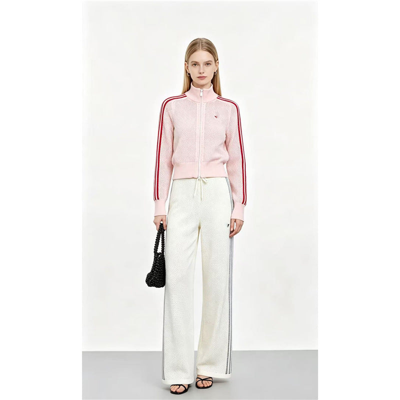 Completo donna in maglia traforata, maglietta a maniche lunghe e pantaloni, due pezzi