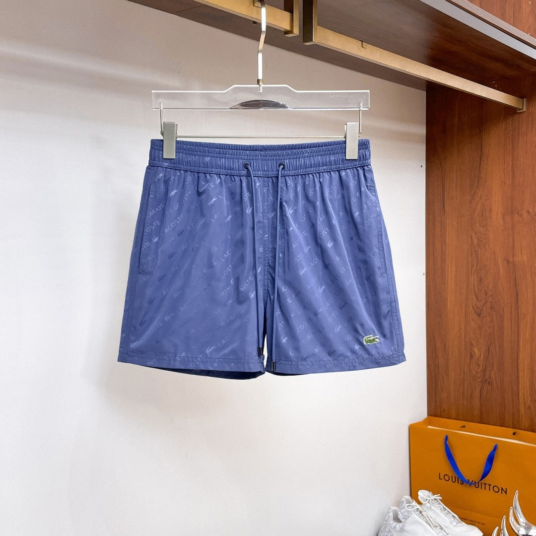 Nuevos pantalones cortos de playa para verano, pantalones deportivos casuales de secado rápido, estilo masculino holgado en stock, otras marcas