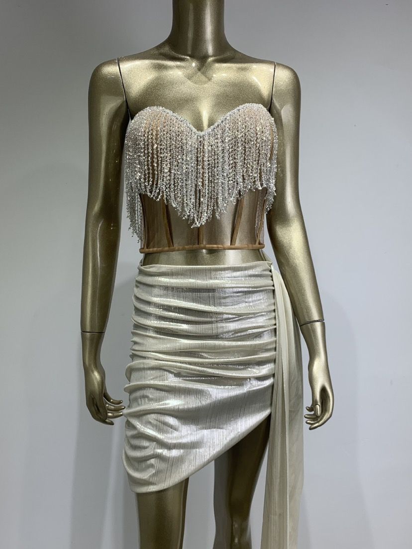 Popular conjunto dorado transparente sin tirantes + falda corta drapeada de la Estación Independiente de Comercio Exterior, vestido de fiesta elegante y picante