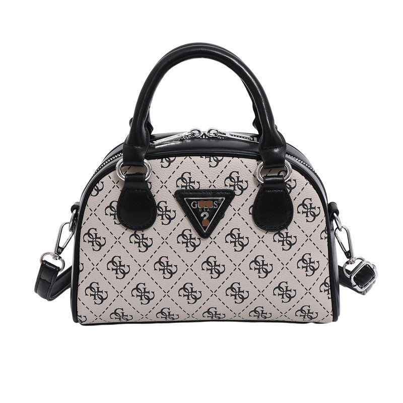Comercio extranjero bolso de un solo hombro flor antigua para mujer otoño e invierno 2025 bolso de bolos contrastante bolso bandolera de moda y versátil