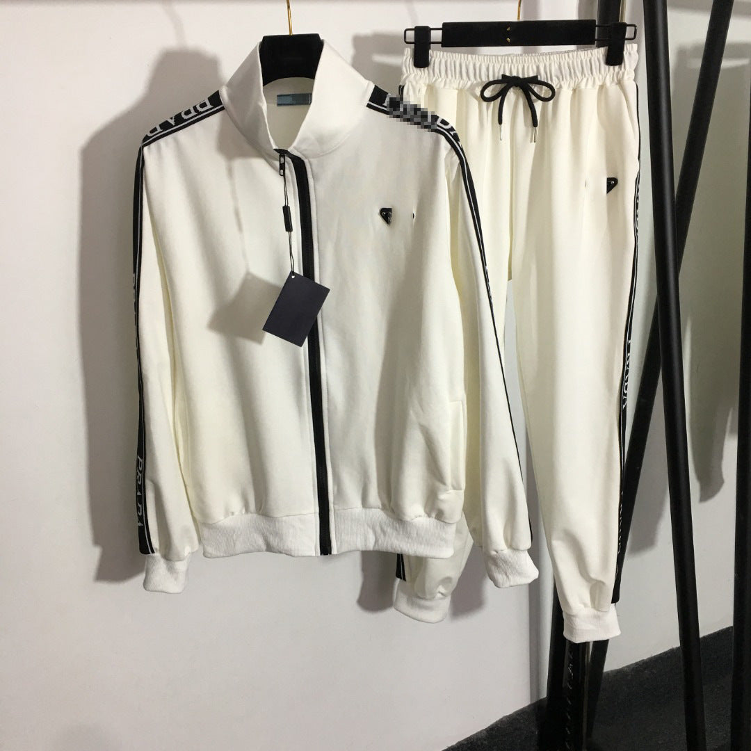 Chaqueta de camiseta de manga larga con cremallera + borde de cinta con cintura elástica de cintura y pantalones casuales de la Nanyou de alta gama triángulo