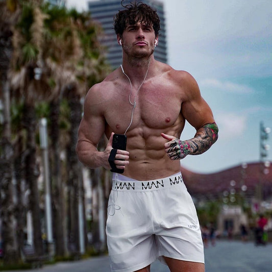 Pantalones cortos deportivos de moda masculino, pantalones de entrenamiento deportivo ligeros, transpirables y que absorben la humedad, pantalones cortos de marca de moda de secado rápido para correr