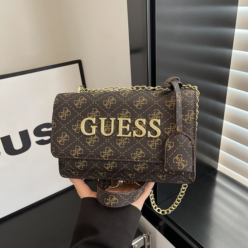 Bolso de mujer vendido de alta calidad Ligero de lujo versátil Bolso de hombro de diseño nicho Bolso de brazo con estampado de letras Bolso de hombro de moda
