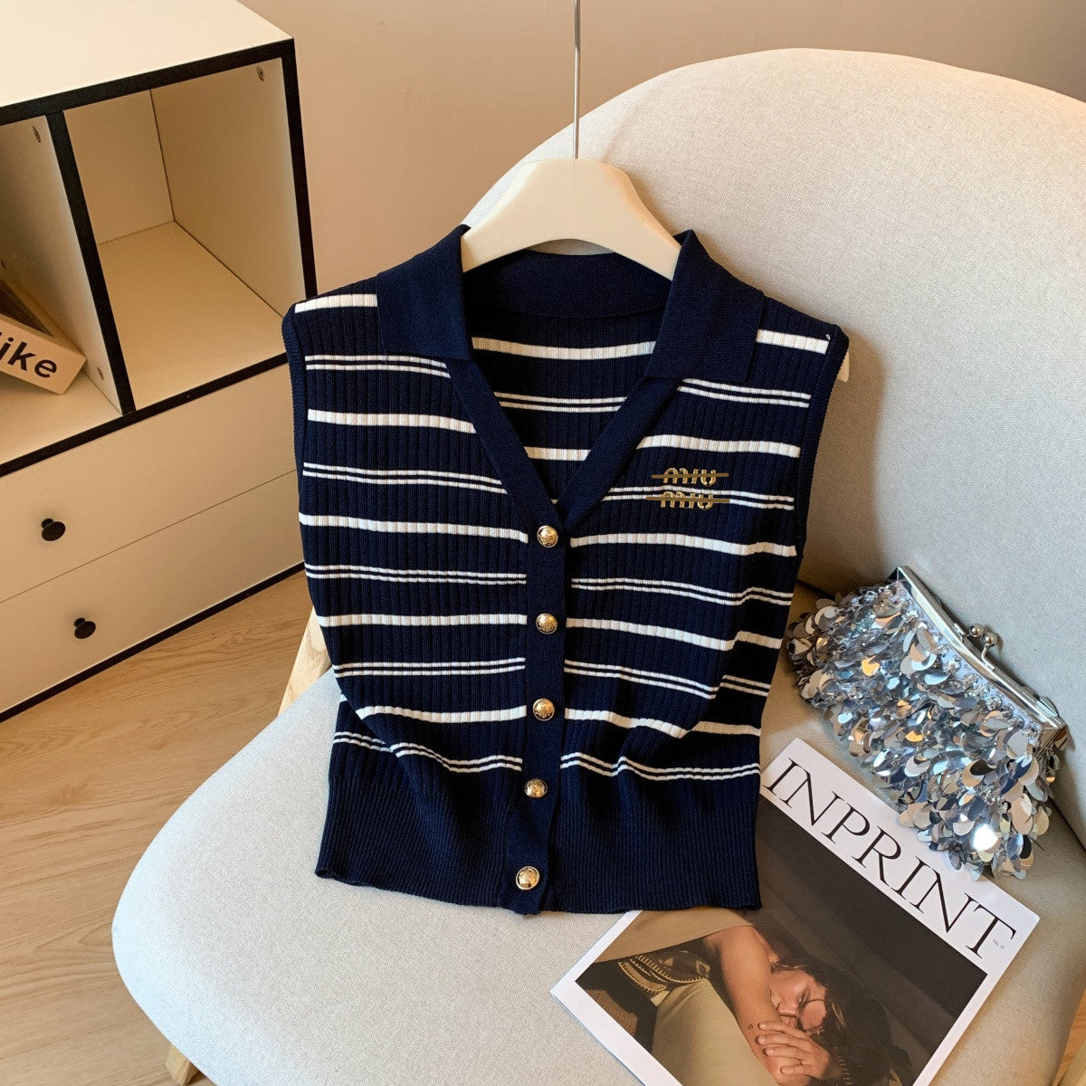 Ligero lujo y chaleco sin mangas estilo Chanel de alta gama, verano 2026 nuevo top de punto bordado versátil bordado