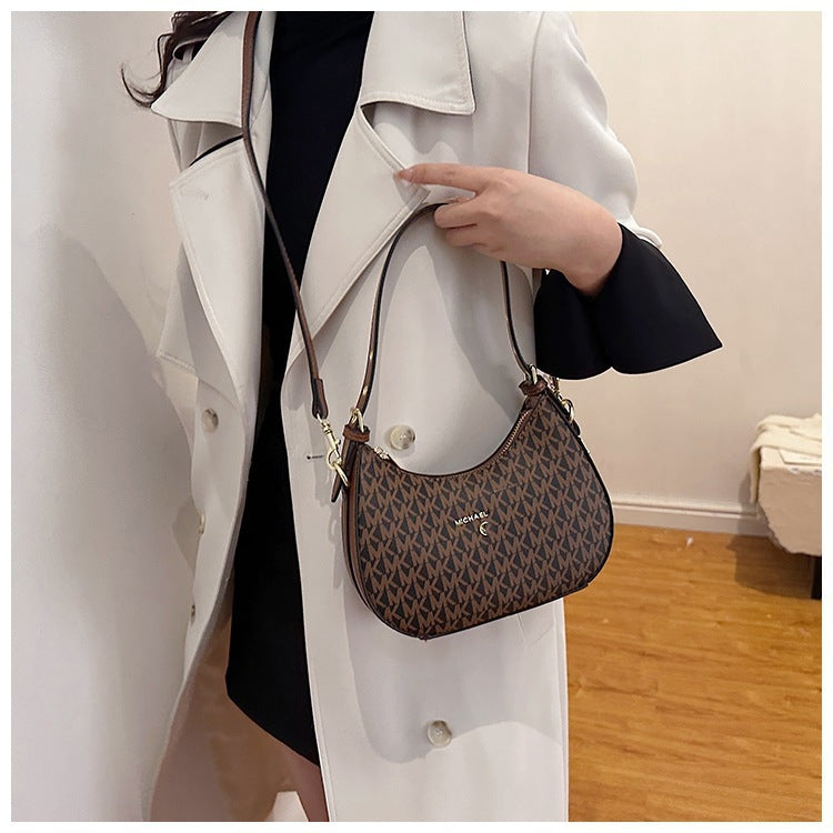 Bolsa de axilas para mujer 2025, nueva y de moda francesa de nicho de alta gama, bolso cruzado de un hombro y media luna