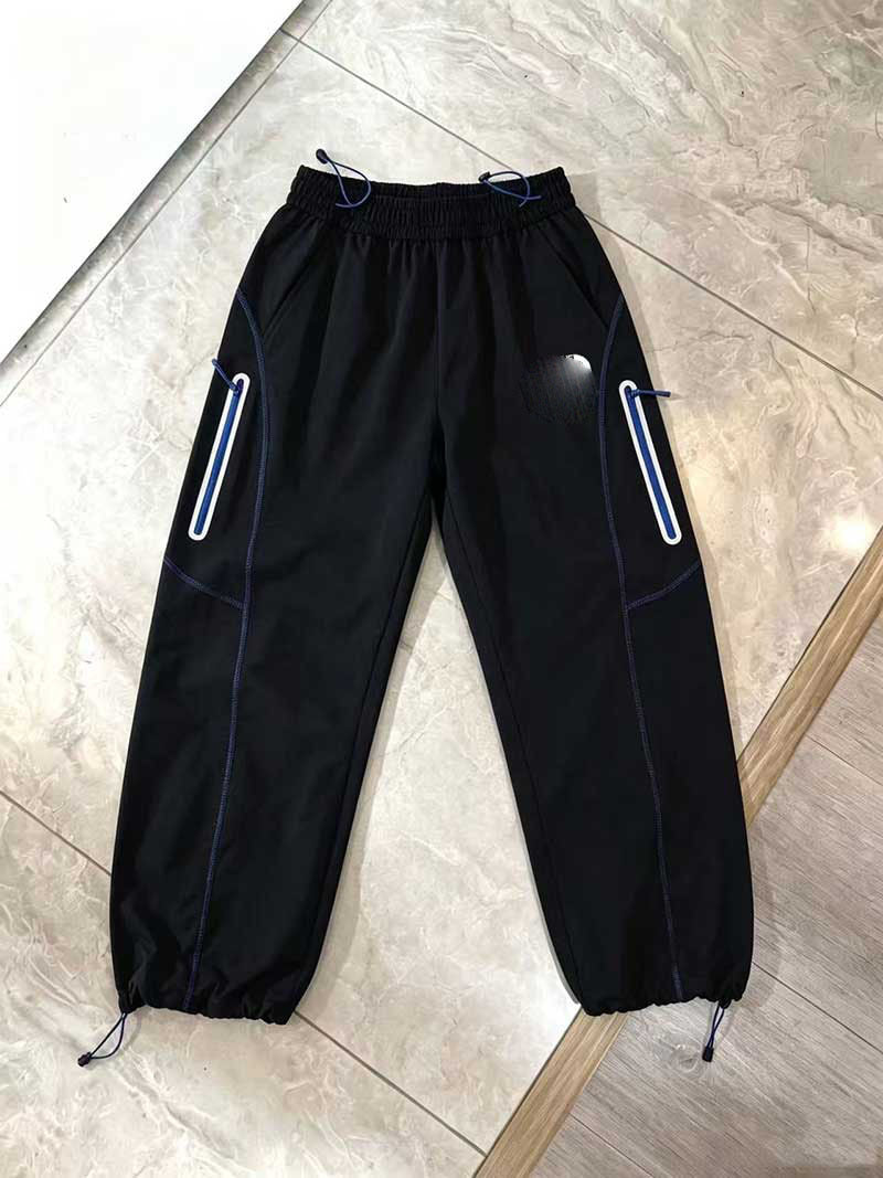 Nouvelle tendance urbaine décontractée 2026 : Pantalons longs taille mi-haute polyvalents et superposés, style unisexe à rayures, couleur unie, respirants, légers et aérés