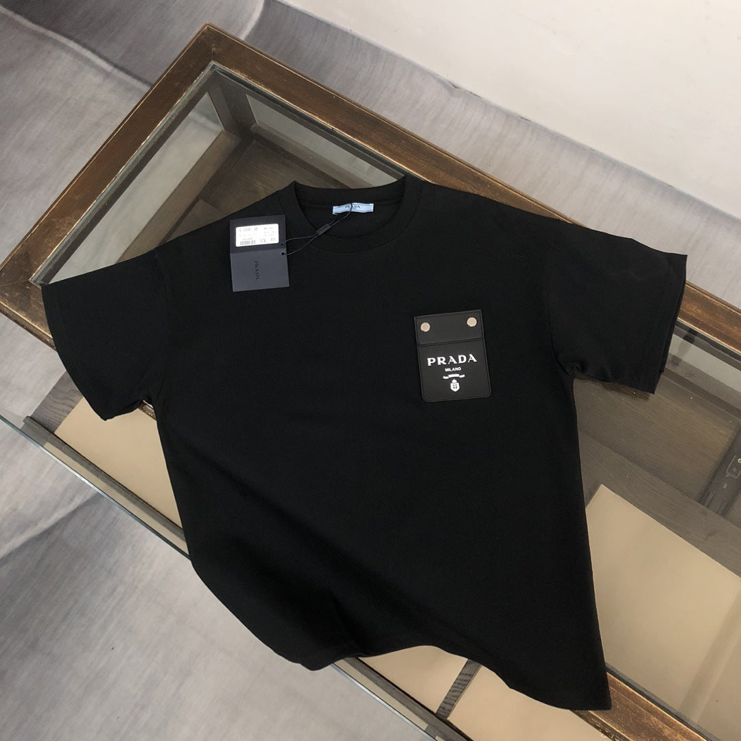 Versión de lujo de alta gama pra Pujia triángulo metálico LOGO, camiseta unisex de verano suelta y versátil con estampado y manga corta