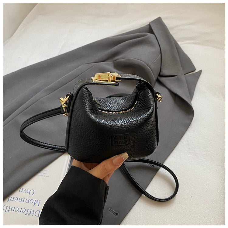 2025 Otoño Nuevo Nicho Bolso de Mano de Color Liso Alta Estética Casual Mono de Cuero Suave de Hombro Bandolera Bolso Pequeño Cuadrado