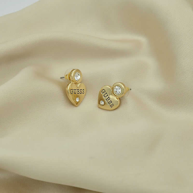 Letras incrustadas de corazón melocotón europeas y estadounidenses exportan, pendientes sencillos de pendientes para mujer, elegancia de nicho