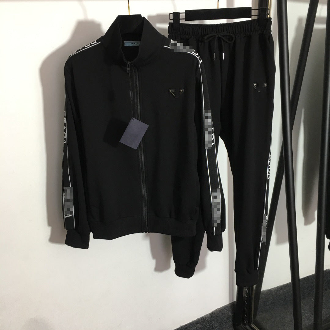 Chaqueta de camiseta de manga larga con cremallera + borde de cinta con cintura elástica de cintura y pantalones casuales de la Nanyou de alta gama triángulo