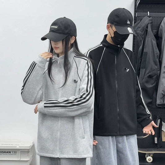 Veste de sport unisexe AD | Trois bandes et coupe ample