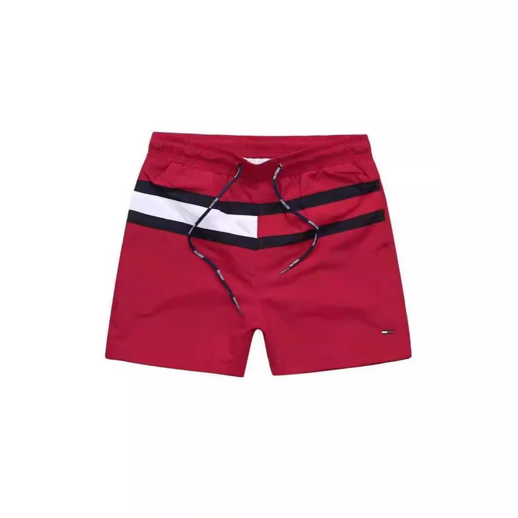 Puesto callejero de fitness para jóvenes de verano transfronterizo, pantalones de tres cuartos de surf en la playa de secado rápido, pantalones cortos deportivos, pantalones cortos de playa europeos y americanos para hombres
