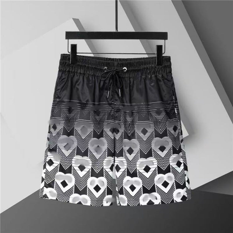 Verano 2026 Nuevos pantalones de playa transfronterizos europeos y americanos de secado rápido, pantalones cortos casuales holgados y de moda al por mayor