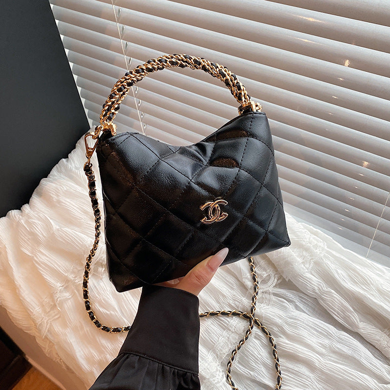 Nuevo bolso de cadena de diamante, bolso de asa torcida Xiangjia, bolso de mujer moderno, bandolera de un solo hombro, bolso de cubo vintage de cuero encerado